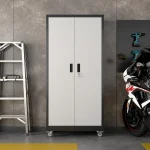 Garage cabinet set in a modern garage next to a motorcycle and tools