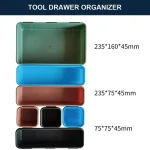 Tool drawer organizer set with various sizes in green, blue, brown, and black